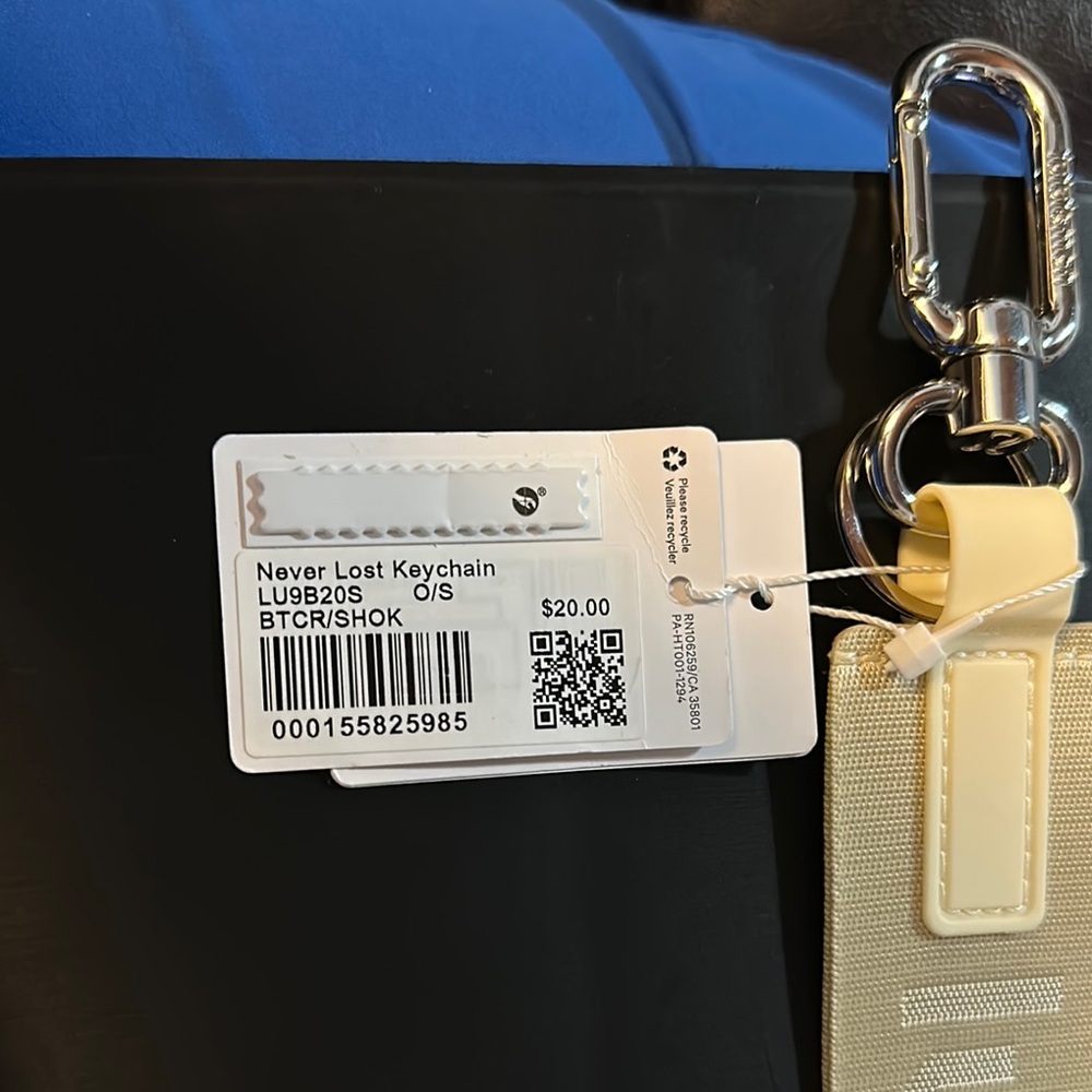 Lululemon Nevertlost Keychain Buttercream *SOLD OUT COLOR* NWT AUTHENTIC